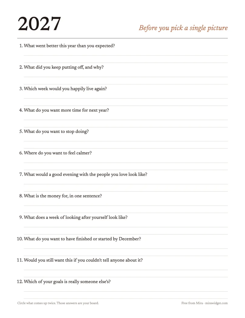 A printable worksheet with twelve vision board questions and lines to answer them